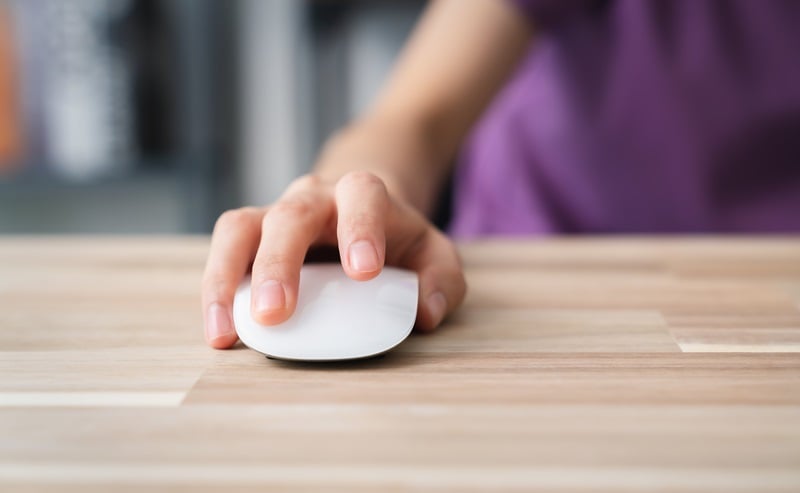 close-up-of-hand-using-on-white-mouse-and-clicking-2023-11-27-05-21-10-utc